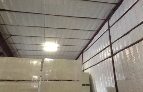 Image showing a large warehouse building after the installation of new insulation in New Mexico