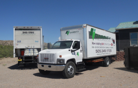 Garrity Insulation, Inc. trucks parked side by side in central New Mexico