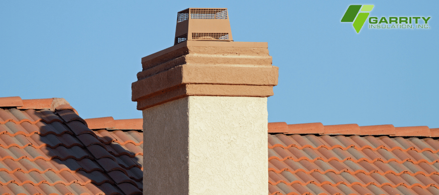 Image showing a rooftop and chimney of a New Mexico home. 