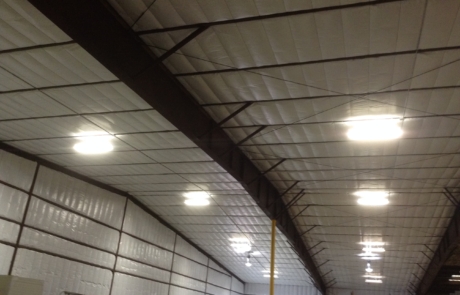 Metal building insulated with white vinyl finish in central New Mexico